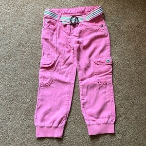 Pink cargo pants with striped belt